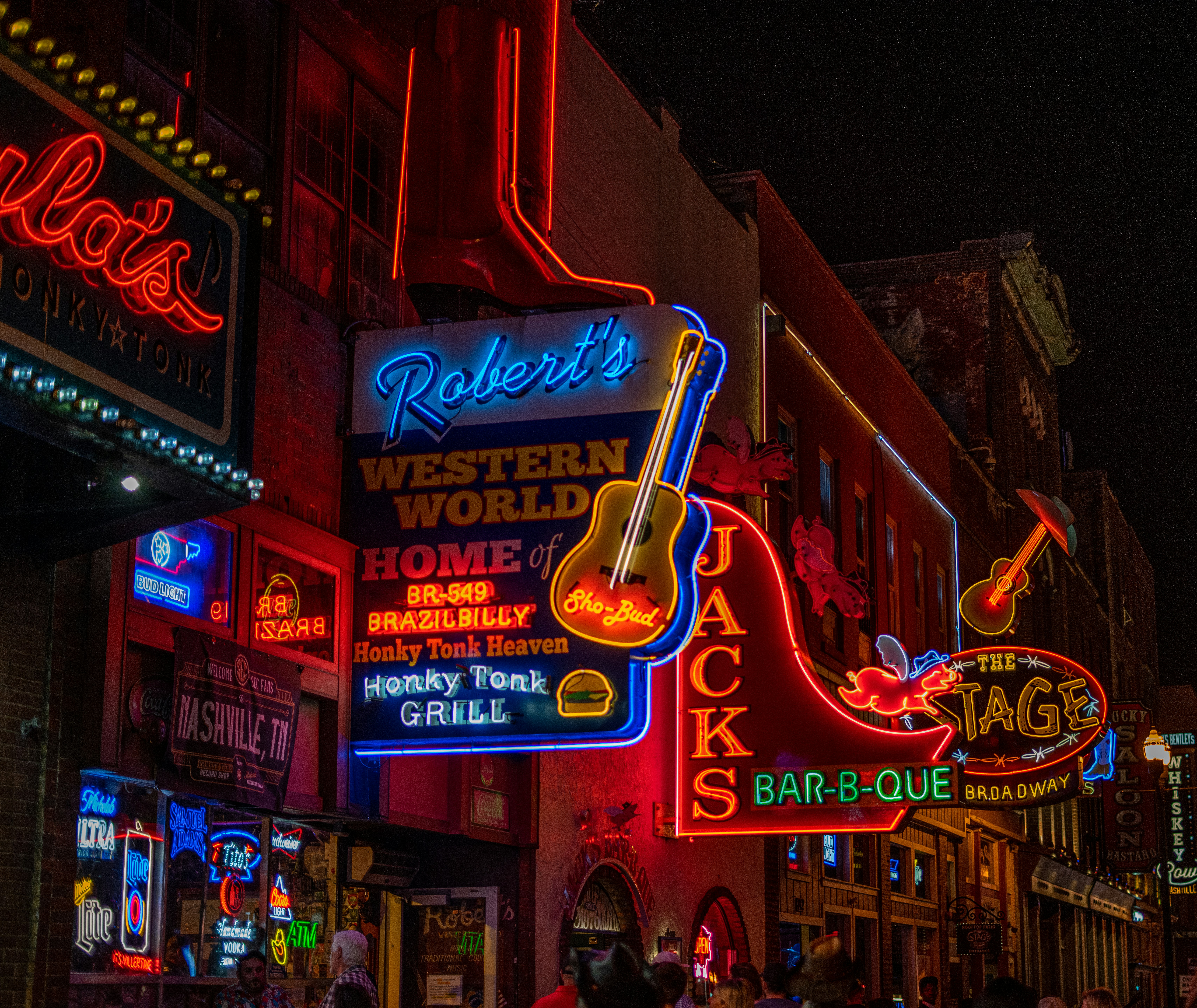 Neon signs of Robert's Western World and the honky-tonks on Lower Broadway in Nashville at night