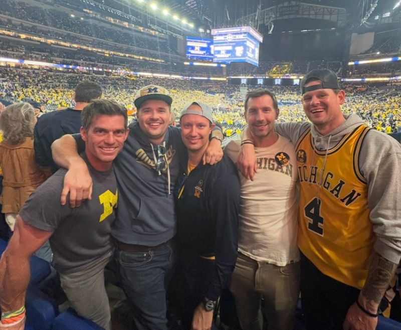 Steven and friends at a Michigan game